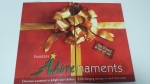 cover of adorenaments board book, red with big gold bow